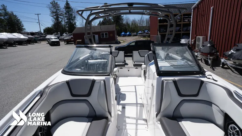 Slide: The Image of 2021 Yamaha Boats 252SE at Long Lake Marina, showcasing sleek interior design. - 14