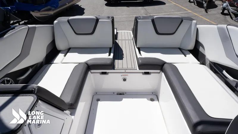 Slide: The Image of 2021 Yamaha Boats 252SE interior with sleek seating at Long Lake Marina. - 23