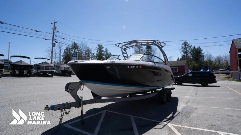 Slide: The Image of 2021 Yamaha Boats 252SE on trailer at Long Lake Marina parking lot. - 6