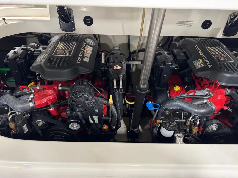 Slide: The Image of Twin Volvo Penta engines in a 2007 Cobalt 302 BR boat. - 14