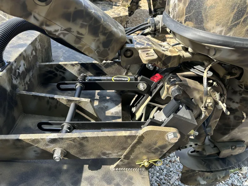 Slide: The Image of Close-up of Excel Viper F4 1751 boat engine components, 2025 model, with camouflage design. - 3