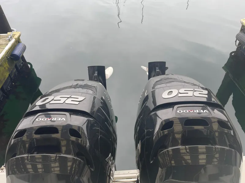 Slide: The Image of Twin 250 Verado outboard motors on a 2015 Seaswirl Striper Alaskan Edition boat. - 12