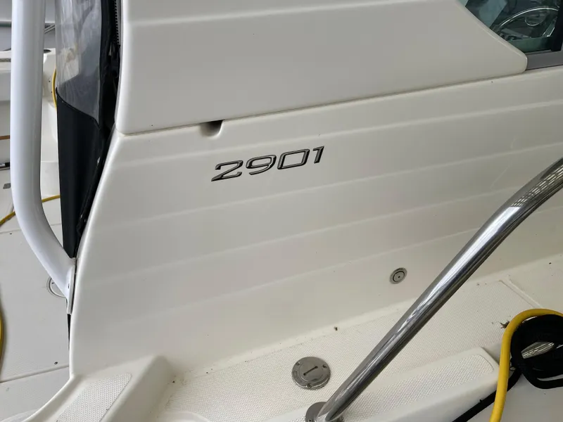 Slide: The Image of 2015 Seaswirl Striper Alaskan Edition boat, model 2901, white exterior detail. - 21