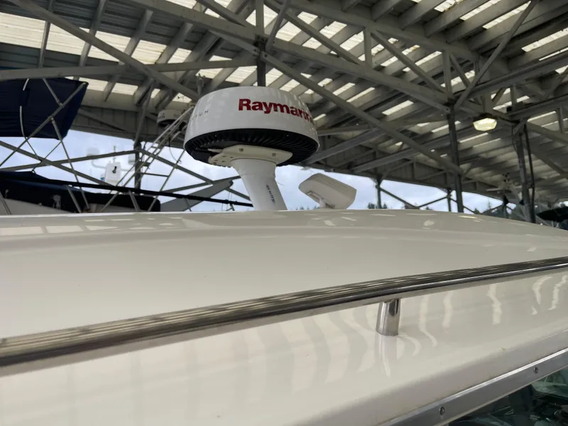Slide: The Image of 2015 Seaswirl Striper Alaskan Edition boat with Raymarine radar under a metal roof. - 24