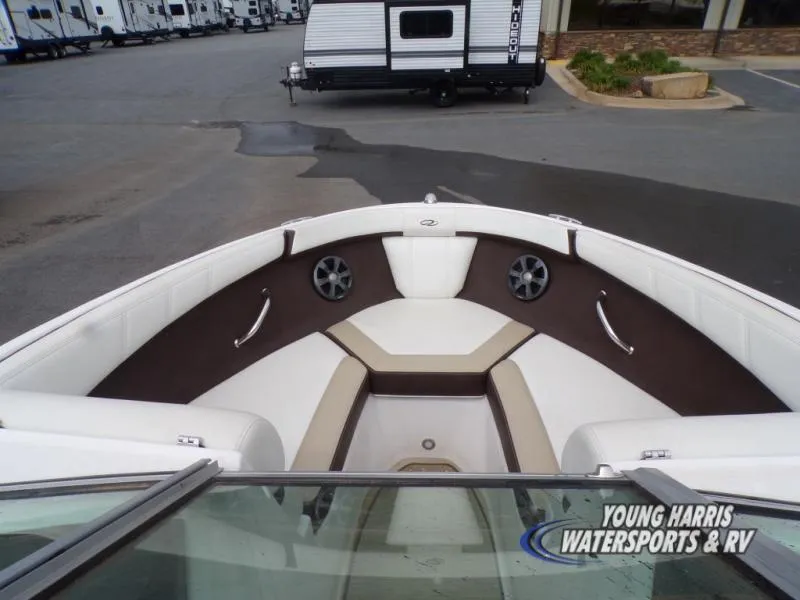 Slide: The Image of Bow seating area of a 2017 Regal 2000 ES boat at a dealership. - 10