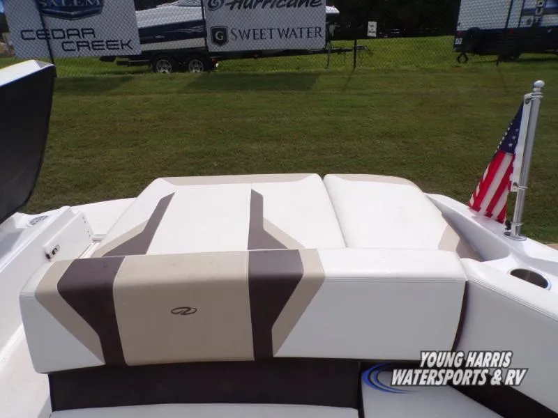 Slide: The Image of Rear view of a 2017 Regal 2000 ES boat with American flag and logo. - 16