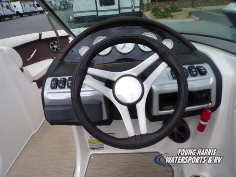 Slide: The Image of Steering wheel and dashboard of 2017 Regal 2000 ES boat at Young Harris Watersports. - 9