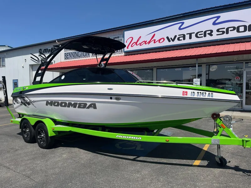 Slide: The Image of 2014 Moomba Mobius LSV boat on trailer at Idaho Water Sports dealership. - 14