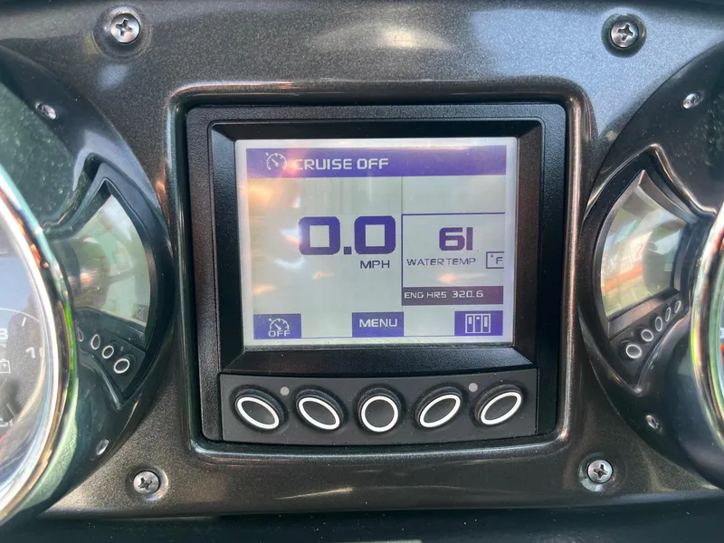 Slide: The Image of Dashboard display of a 2014 Moomba Mobius LSV showing speed and water temperature. - 30