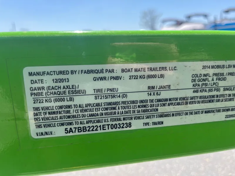 Slide: The Image of 2014 Moomba Mobius LSV trailer label with specifications and compliance details. - 37