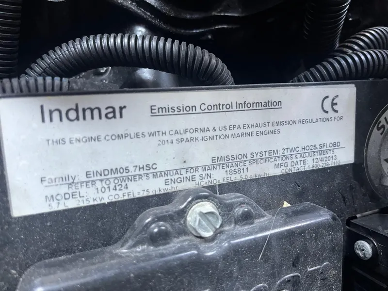 Slide: The Image of 2014 Moomba Mobius LSV engine emission control label, Indmar compliance details visible. - 38