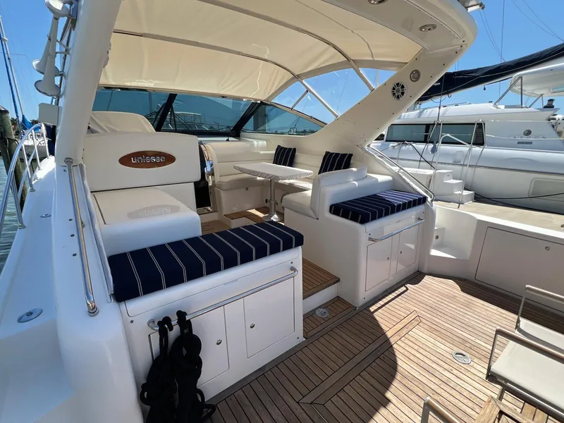 Slide: The Image of 2001 Uniesse 42 Open yacht with spacious deck and seating area. - 8