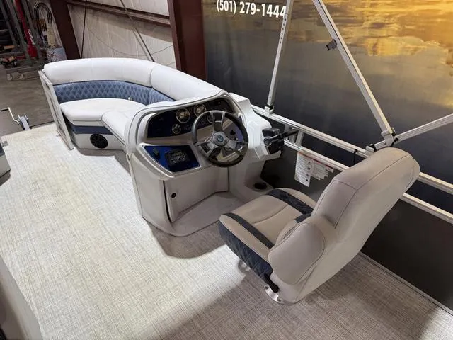 Slide: The Image of 2023 Nepallo Pontoons 18TL interior with Suzuki 60, featuring plush seating and modern controls. - 10