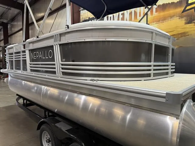 Slide: The Image of 2023 Nepallo Pontoons 18TL with Suzuki 60, displayed indoors on a trailer. - 5