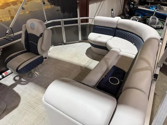 Slide: The Image of 2023 Nepallo Pontoons 18TL interior with plush seating and modern design. - 9