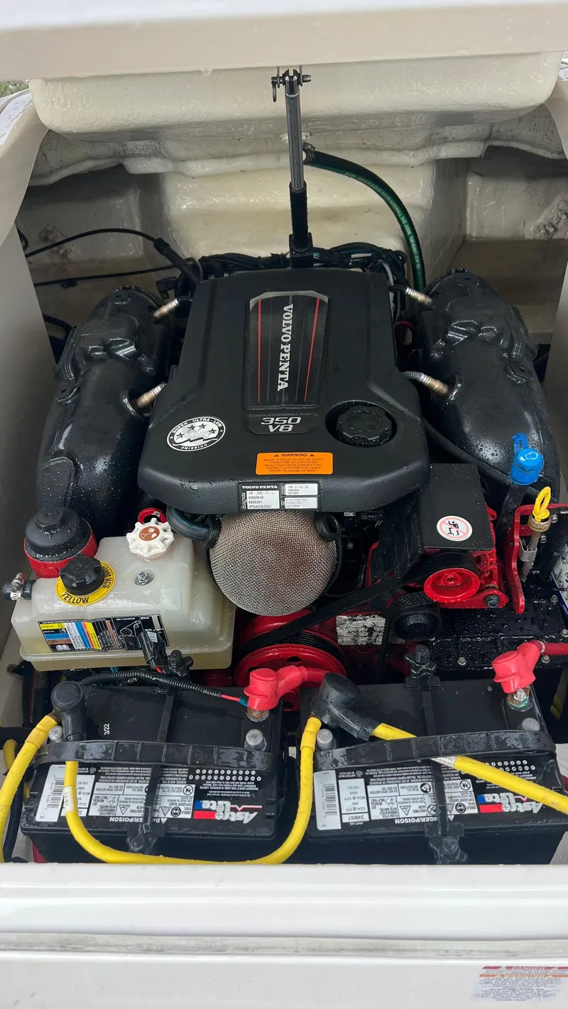 Slide: The Image of 2017 Chaparral 246 SSi engine compartment with visible components and wiring. - 21