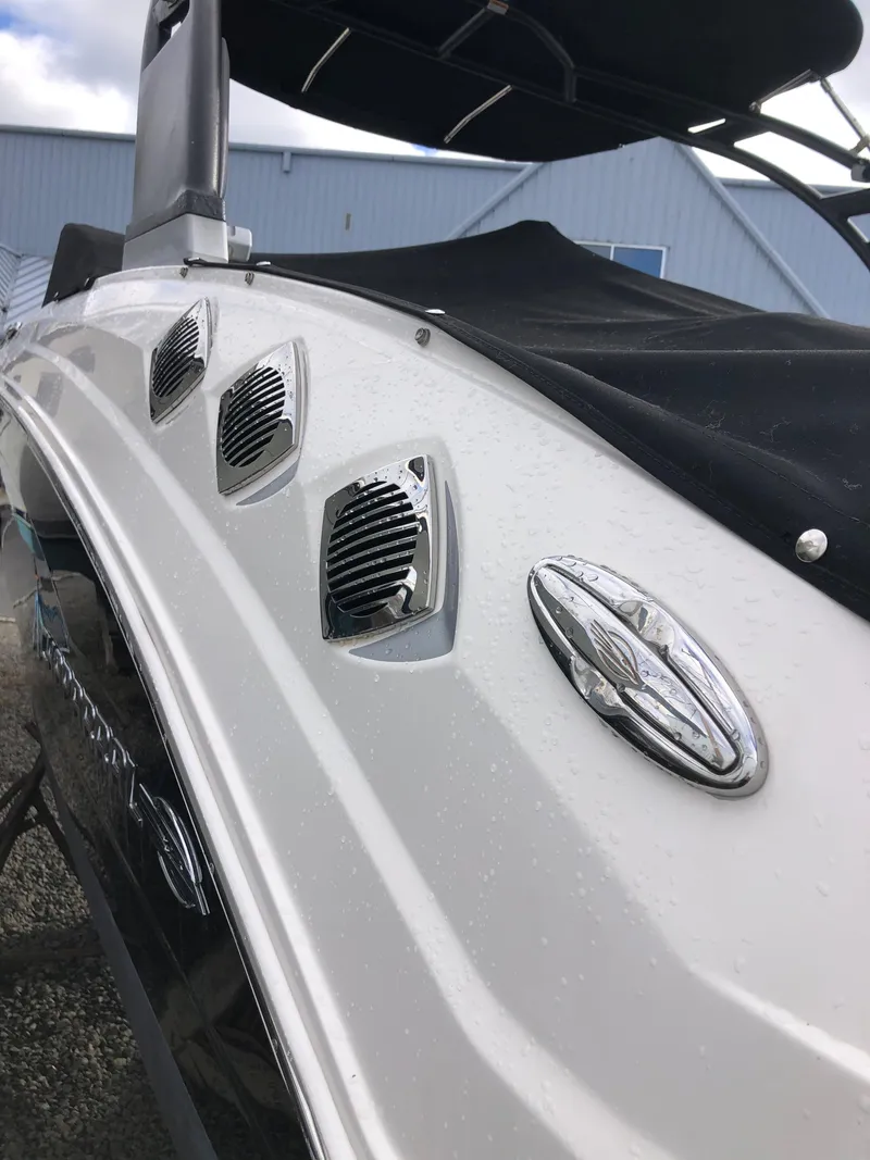 Slide: The Image of 2017 Chaparral 246 SSi boat with sleek design and chrome accents. - 3