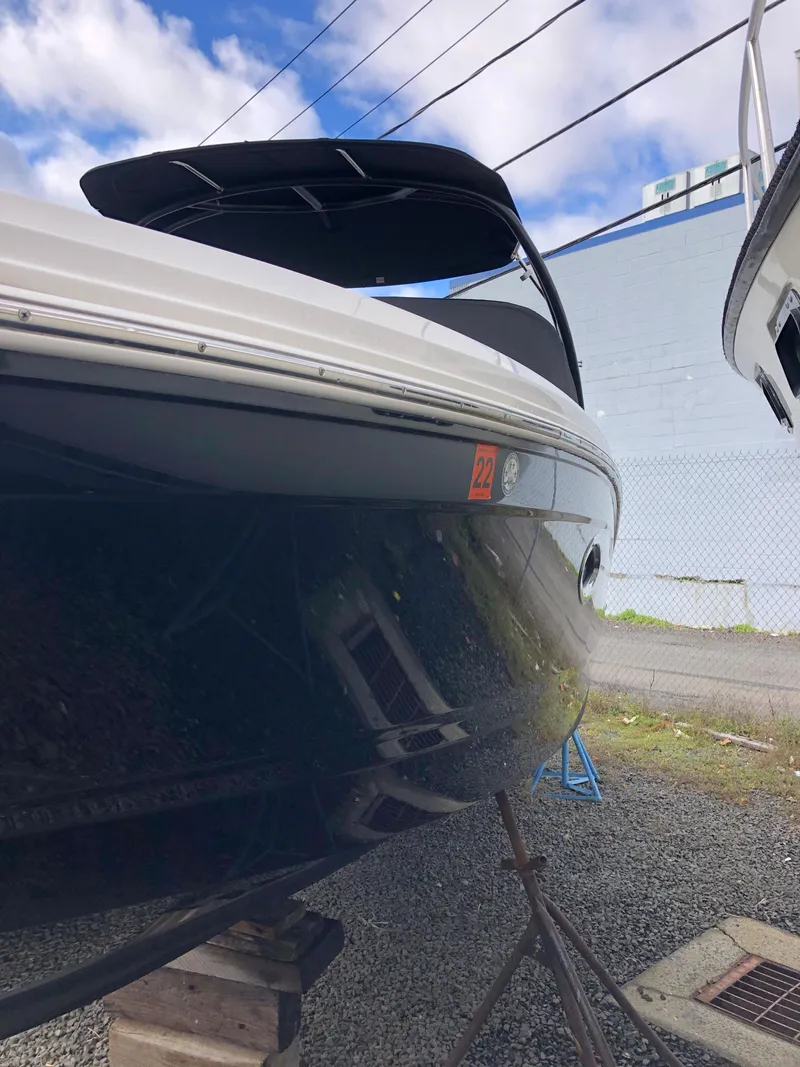 Slide: The Image of 2017 Chaparral 246 SSi boat on stands, exterior view. - 6