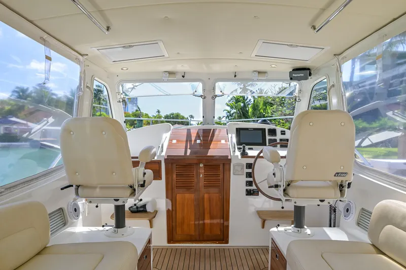 Slide: The Image of Interior of 2013 MJM 36z Downeast boat with helm and seating area. - 15