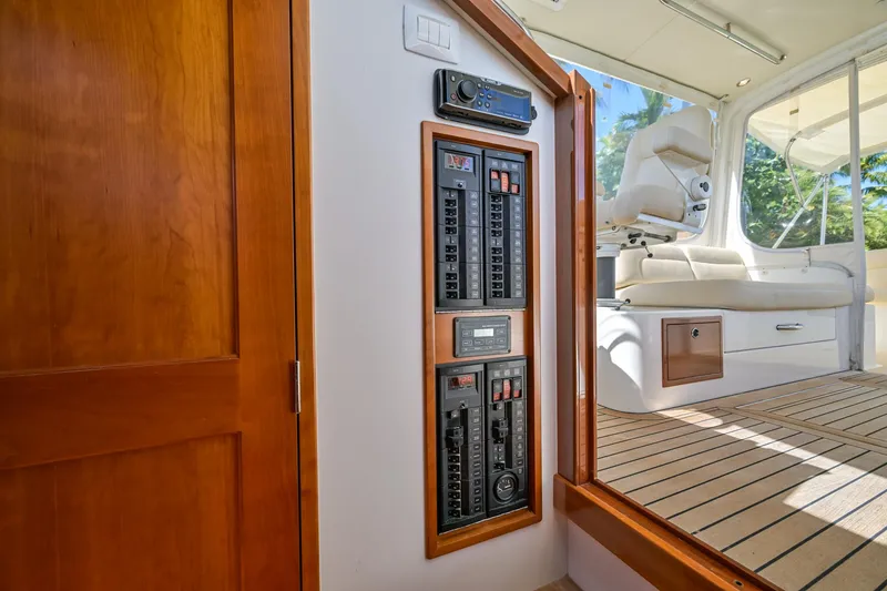 Slide: The Image of Interior of 2013 MJM 36z Downeast yacht with control panels and seating area. - 19