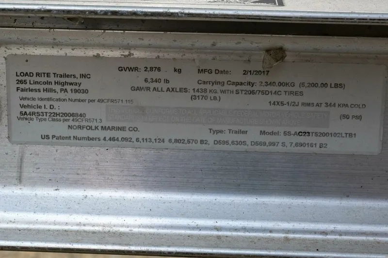 Slide: The Image of Trailer specification label for Load Rite Trailers, Inc., manufactured on 2/1/2017. - 23