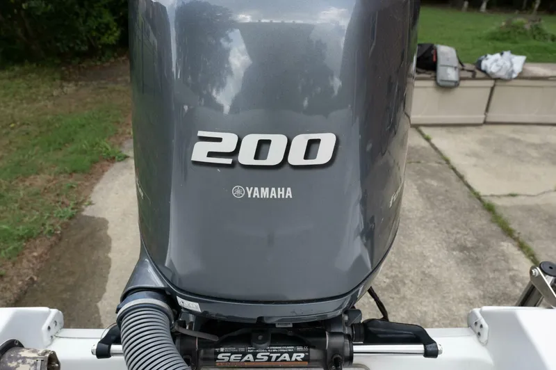 Slide: The Image of Yamaha 200 outboard motor on a 2017 Sea Hunt Ultra 225 boat. - 34