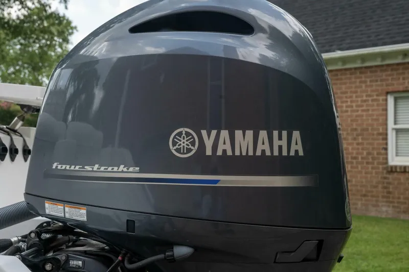 Slide: The Image of Yamaha four-stroke outboard motor on a 2017 Sea Hunt Ultra 225 boat. - 4