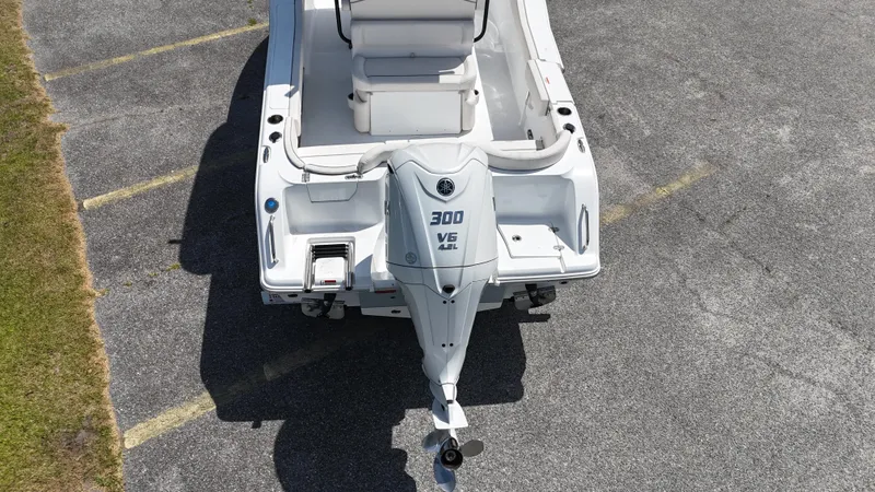 Slide: The Image of 2024 Sea Hunt Ultra 239 SE boat with 300 V6 engine, aerial view. - 6