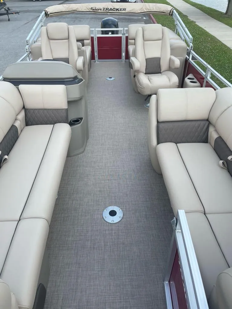 Slide: The Image of 2025 Sun Tracker Party Barge 22 DLX with spacious seating and modern design. - 3
