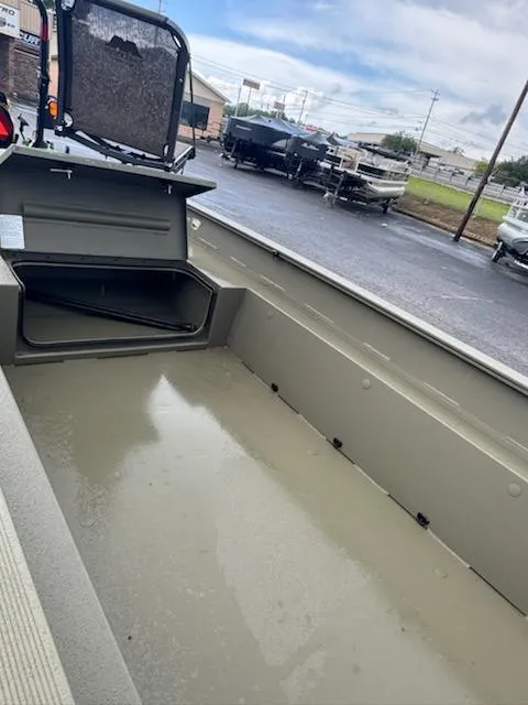 Slide: The Image of 2025 Tracker Grizzly 1650 T Prairie Wings Edition boat interior, showcasing storage compartment. - 6