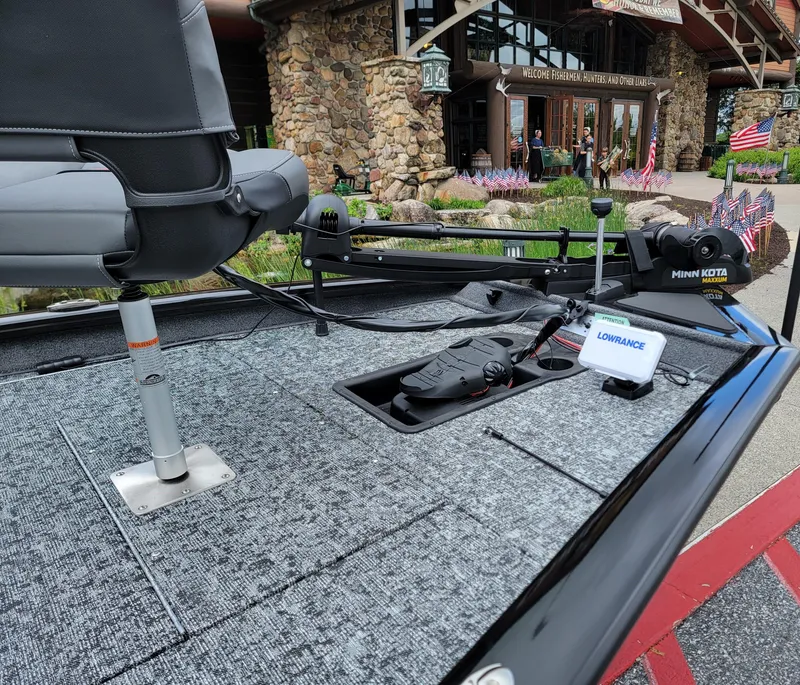 Slide: The Image of 2025 Tracker Pro Team 175 boat deck with Minn Kota trolling motor and Lowrance electronics. - 3