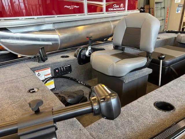 Slide: The Image of 2025 Tracker Panfish 17 boat interior with seating and controls, showcasing modern design and functionality. - 4