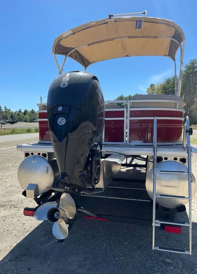 Slide: The Image of 2025 Sun Tracker Party Barge 22 RF DLX pontoon boat with outboard motor and canopy. - 5