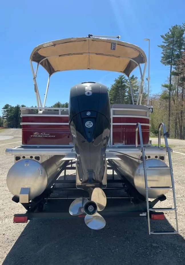 Slide: The Image of 2025 Sun Tracker Party Barge 22 RF DLX pontoon boat with canopy and outboard motor. - 6