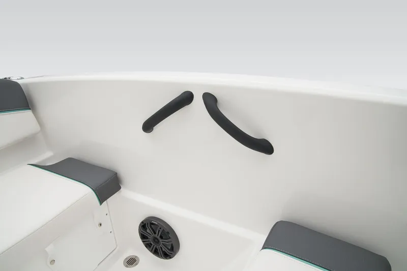 Slide: The Image of 2025 Tahoe T16 boat with seating, canopy, and motor, displayed on pavement. - 8