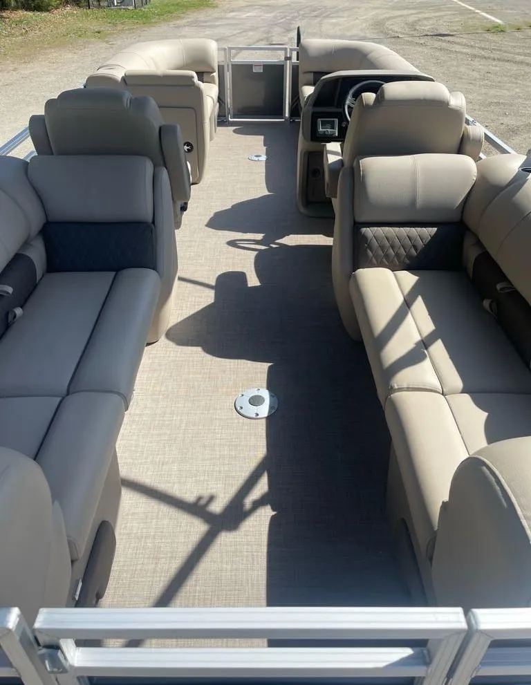 Slide: The Image of 2025 Sun Tracker Party Barge 22 DLX interior with spacious seating and modern design. - 5