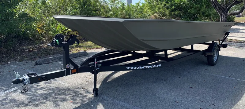 Slide: The Image of 2025 Tracker GRIZZLY 2072 Utility boat on trailer, parked outdoors. - 5