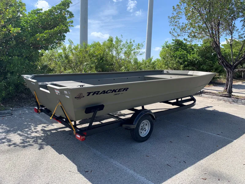 Slide: The Image of 2025 Tracker GRIZZLY 2072 Utility boat on trailer in sunny parking lot. - 6