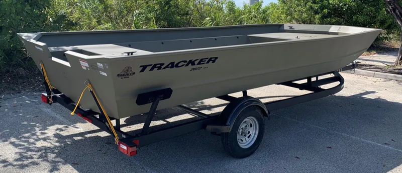 Slide: The Image of 2025 Tracker GRIZZLY 2072 Utility boat on trailer, parked outdoors. - 7
