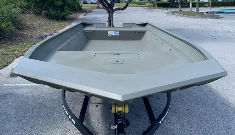 Slide: The Image of 2025 Tracker GRIZZLY 2072 Utility boat on trailer in parking lot. - 8