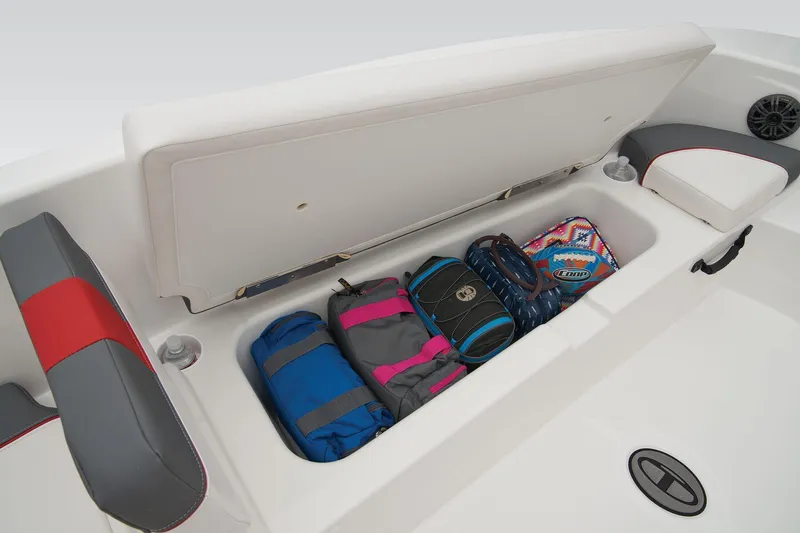 Slide: The Image of 2025 Tahoe T18 boat interior with white and gray seating, red accents, and spacious layout. - 10