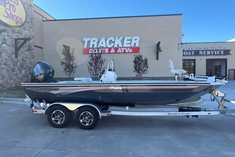 The Image of 2025 Ranger RB200 boat on trailer outside Tracker Boats & ATVs store. - 0