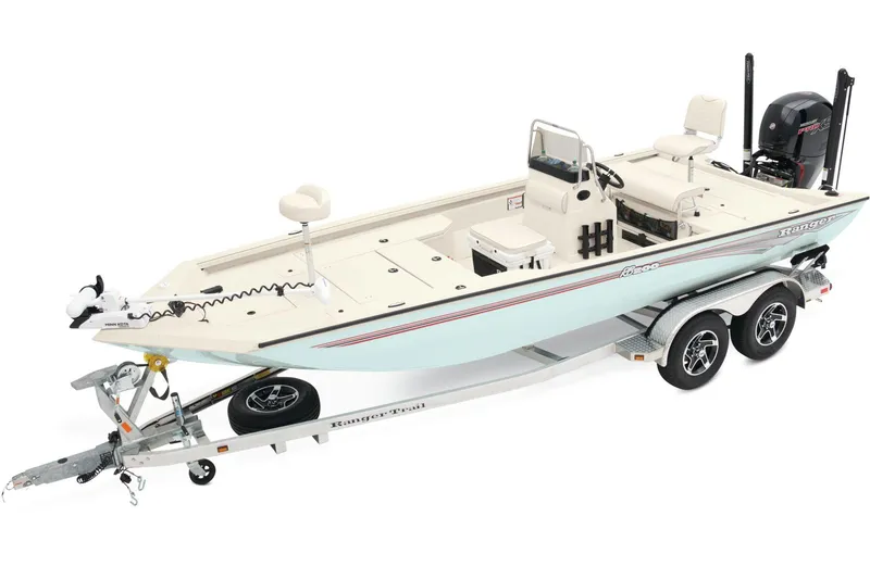 Slide: The Image of 2025 Ranger RB200 boat with white seating and trolling motor in a driveway. - 1