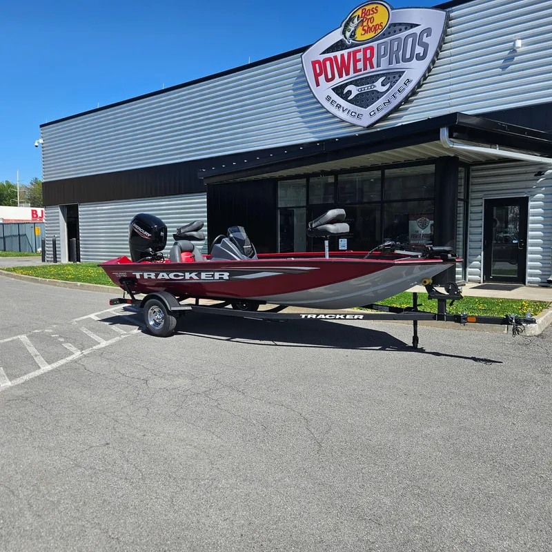 The Image of 2025 Tracker Pro Team 175 boat on trailer outside Power Pros service center. - 0