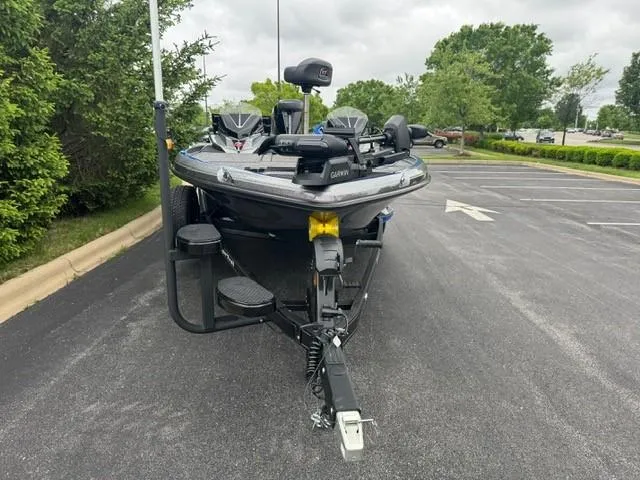 Slide: The Image of 2025 Ranger Z520R Cup-Equipped boat on trailer in parking lot. - 2