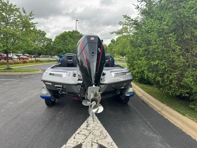 Slide: The Image of 2025 Ranger Z520R Cup-Equipped boat on a trailer in a parking lot. - 7