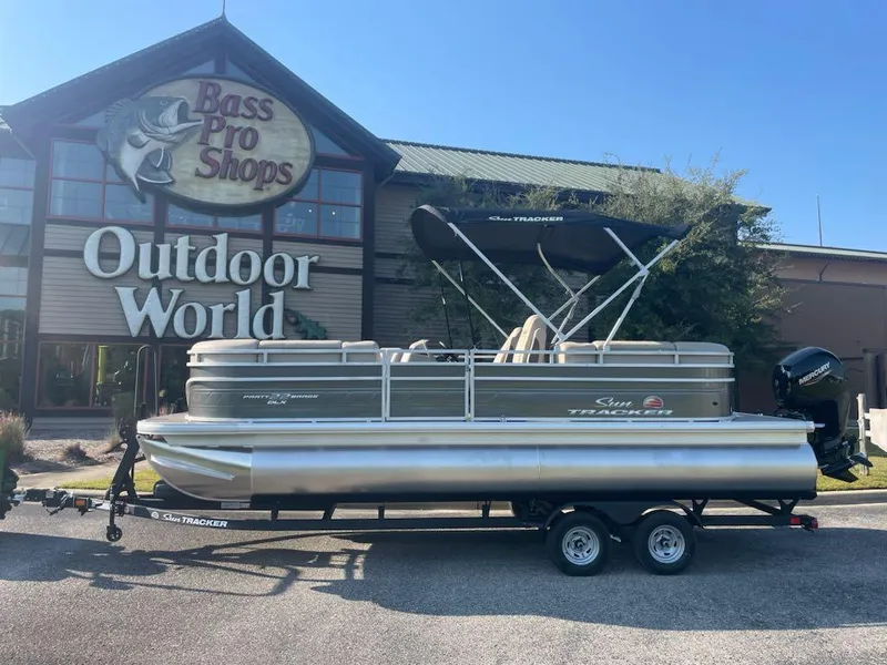 Slide: The Image of 2025 Sun Tracker Party Barge 22 DLX pontoon boat at Bass Pro Shops Outdoor World. - 5