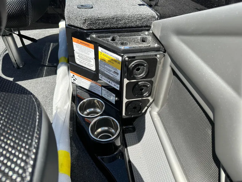 Slide: The Image of 2025 Ranger 620FS Cup Equipped boat interior with cup holders and power outlets. - 20
