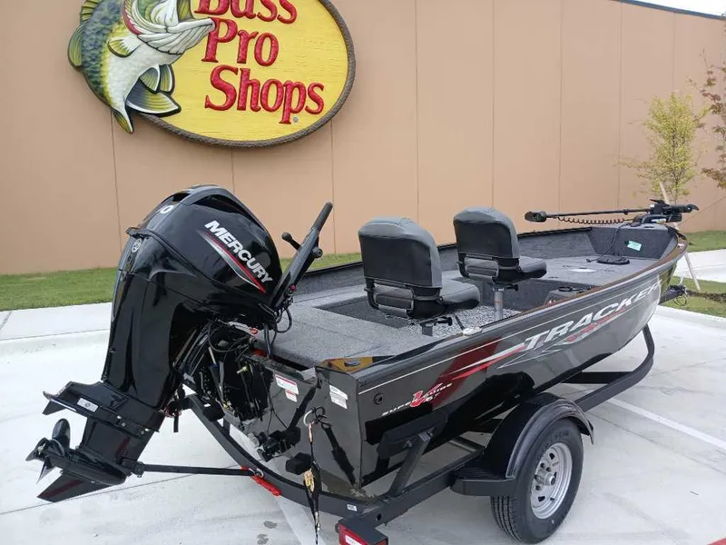 Slide: The Image of 2025 Tracker Super Guide V-16 T boat at Bass Pro Shops, featuring a Mercury outboard motor. - 3
