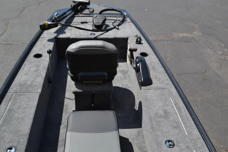 Slide: The Image of 2025 Tracker Panfish 17 boat interior with seating and controls. - 4